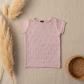 Pull tricot rose Kiabi bouton épaule – fond bohème
